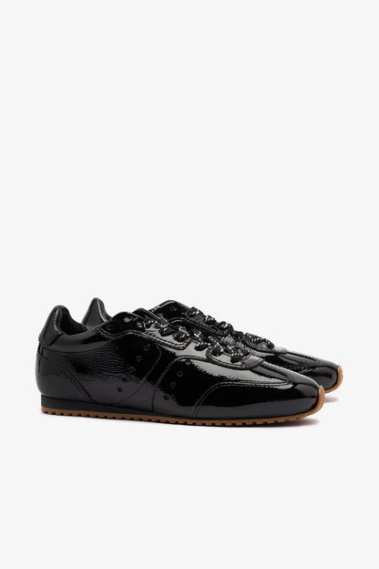 Stella Sneaker In Black Patent Leather